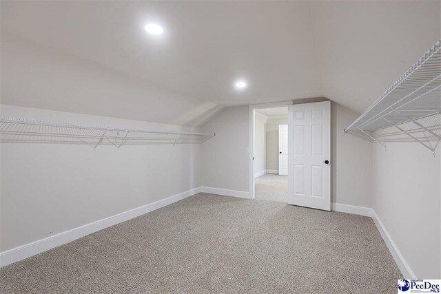 400 Millstone Rd, Florence, SC 29505 - walk in closet featuring carpet flooring and vaulted ceiling