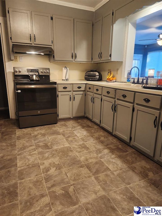 kitchen featuring ceiling fan, gray cabinets, sink, and stainless steel range with electric cooktop