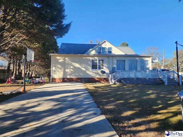 view of front of home with a deck