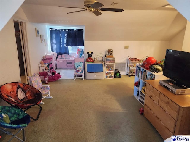 recreation room featuring lofted ceiling, carpet floors, and ceiling fan