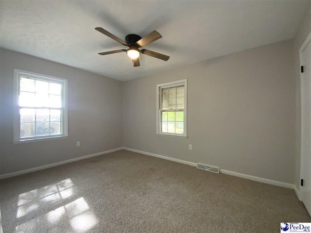 125 Forest Dr, Bennettsville, SC 29512 - unfurnished room with a ceiling fan, baseboards, and carpet floors