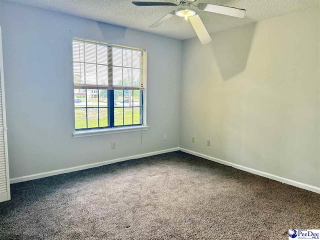 1215-G Brittany Dr, Florence, SC 29501 - carpeted spare room with plenty of natural light, a ceiling fan, a textured ceiling, and baseboards