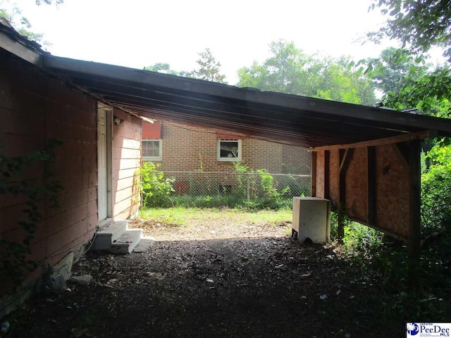 view of yard featuring a carport