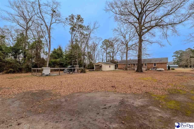 view of yard with a shed