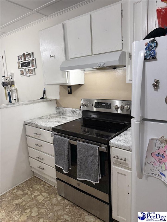 kitchen featuring white refrigerator, white cabinetry, and stainless steel range with electric cooktop