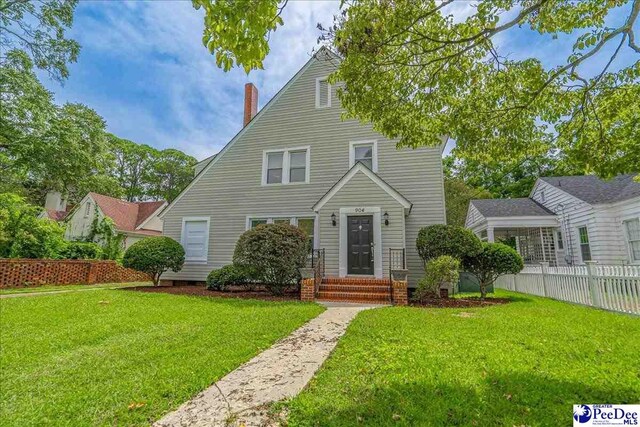 904 Madison Ave, Florence, SC 29501 - view of front of house with a chimney