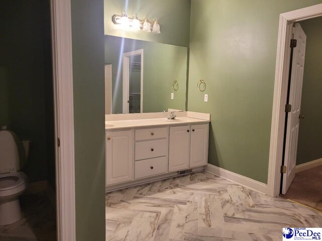 3675 W Pointe Dr, Florence, SC 29501 - bathroom with double vanity and marble look tiles
