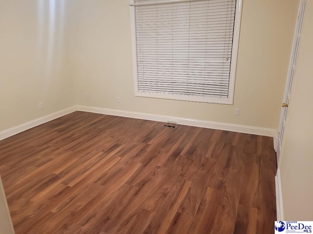 3675 W Pointe Dr, Florence, SC 29501 - spare room featuring dark wood-type flooring