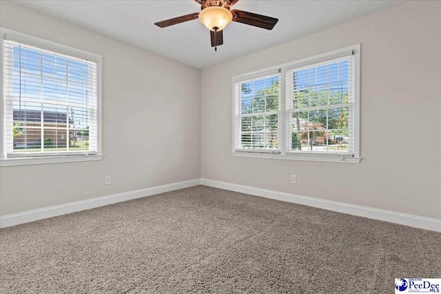 1526 Hunter St, Florence, SC 29505 - unfurnished room featuring carpet flooring and a ceiling fan