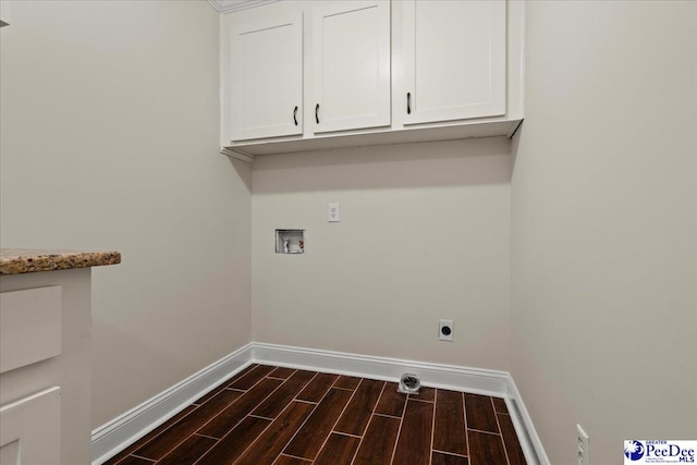 1526 Hunter St, Florence, SC 29505 - laundry area featuring cabinet space, hookup for a washing machine, wood tiled floors, and hookup for an electric dryer