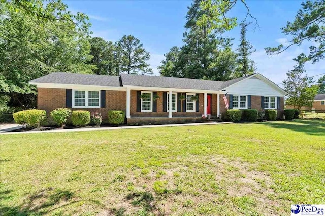 1526 Hunter St, Florence, SC 29505 - single story home featuring brick siding and a front lawn