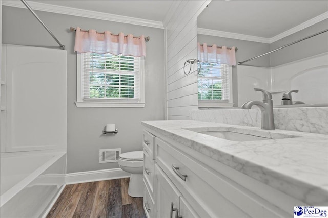 1526 Hunter St, Florence, SC 29505 - bathroom with vanity, crown molding,  shower combination, and wood finished floors