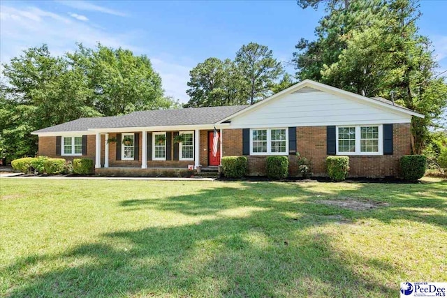 1526 Hunter St, Florence, SC 29505 - single story home with a front yard and brick siding