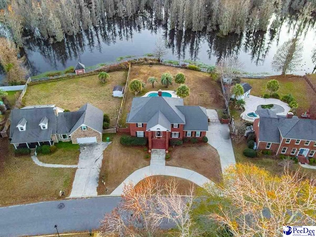 bird's eye view with a water view