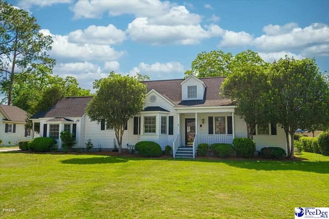 cape cod-style house with a front yard and a porch