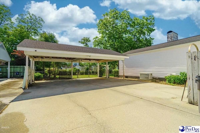 view of car parking with a carport