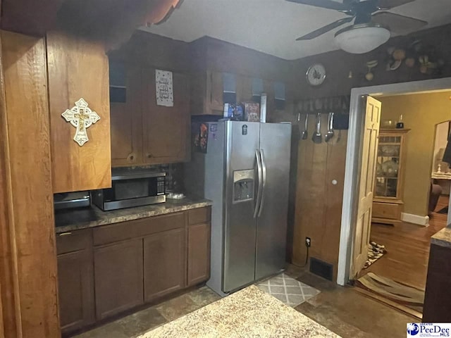 kitchen featuring ceiling fan and appliances with stainless steel finishes