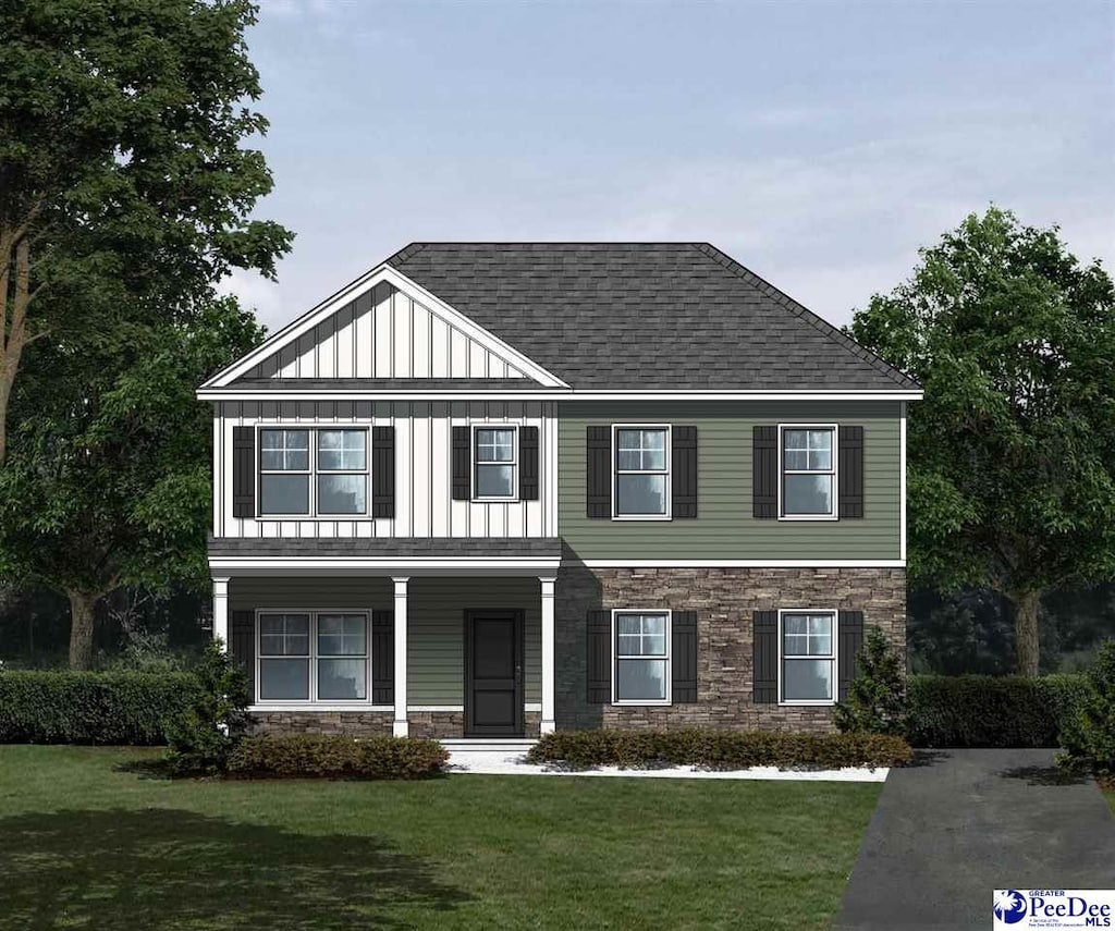 5006 E Old Marion, Florence, SC 29506 - view of front of house featuring stone siding, board and batten siding, covered porch, and a front lawn