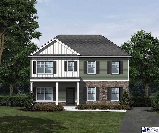 5006 E Old Marion, Florence, SC 29506 - view of front of house featuring stone siding, board and batten siding, covered porch, and a front lawn
