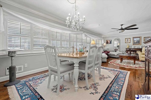 dining room with ornamental molding, wood finished floors, and a wealth of natural light