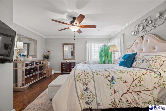 bedroom featuring a ceiling fan, crown molding, and wood finished floors