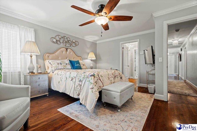 bedroom featuring ornamental molding, ceiling fan, baseboards, and wood finished floors