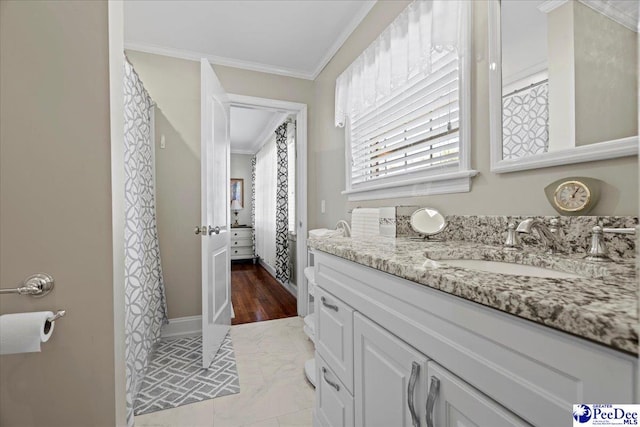 full bathroom featuring vanity and crown molding