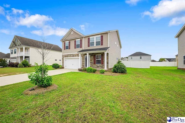 1224 Barn Owl Rd, Effingham, SC 29541 - view of front of home with stone siding, concrete driveway, and a garage