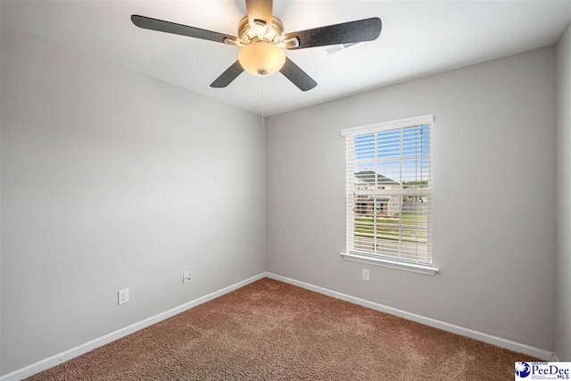 1224 Barn Owl Rd, Effingham, SC 29541 - carpeted empty room featuring baseboards and ceiling fan
