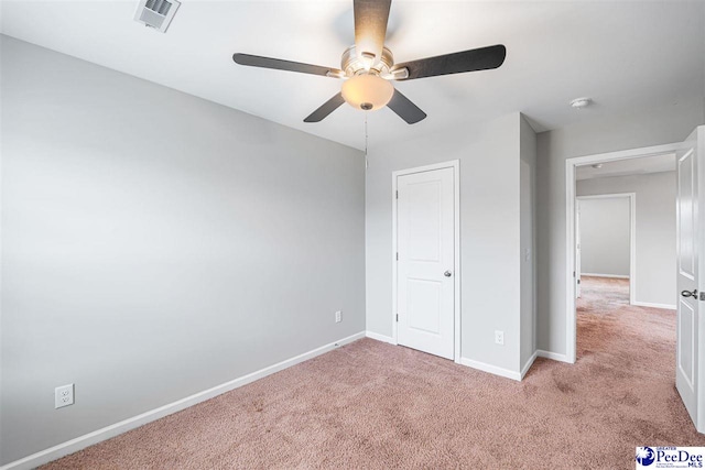 1224 Barn Owl Rd, Effingham, SC 29541 - unfurnished bedroom with carpet, baseboards, and ceiling fan