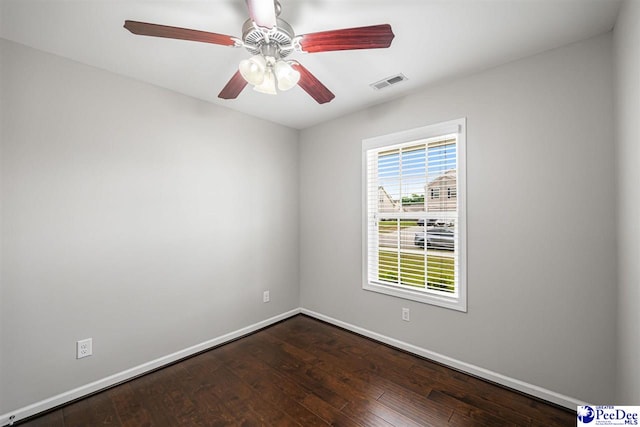 1224 Barn Owl Rd, Effingham, SC 29541 - empty room with baseboards, dark wood-style flooring, and ceiling fan