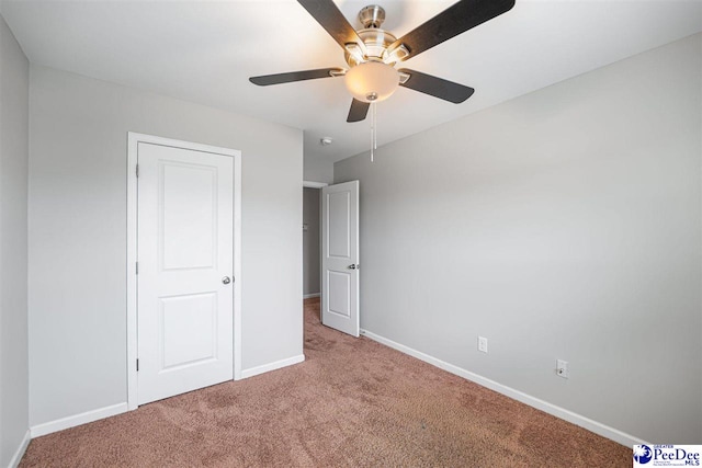 1224 Barn Owl Rd, Effingham, SC 29541 - unfurnished bedroom with carpet flooring, baseboards, and a ceiling fan