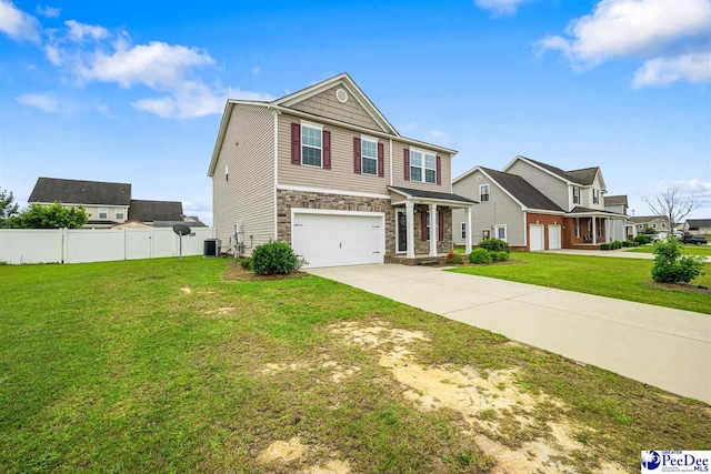 1224 Barn Owl Rd, Effingham, SC 29541 - view of front facade featuring stone siding, an attached garage, central AC unit, and concrete driveway