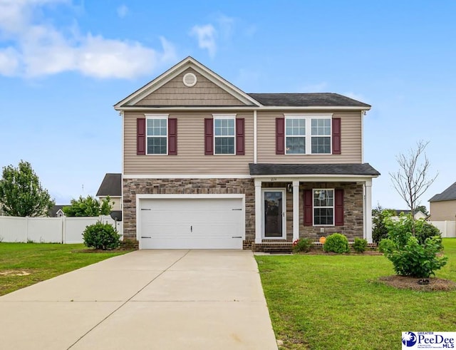 1224 Barn Owl Rd, Effingham, SC 29541 - view of front of property featuring stone siding, driveway, and a garage
