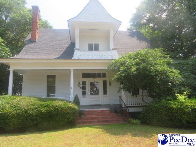 view of front of home featuring covered porch