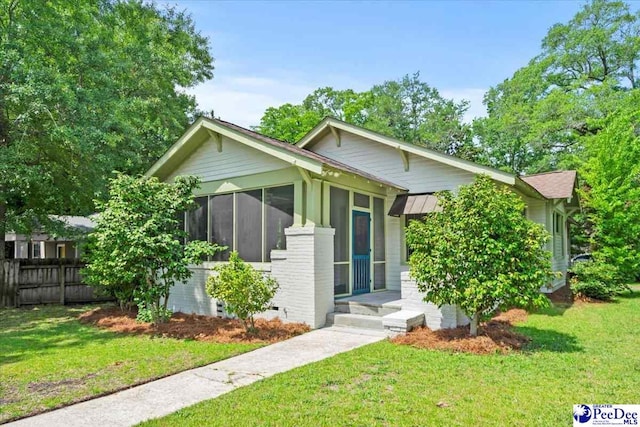 701 S Coit St, Florence, SC 29501 - view of front of property with a sunroom and crawl space