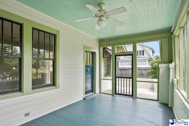 701 S Coit St, Florence, SC 29501 - unfurnished sunroom with ceiling fan