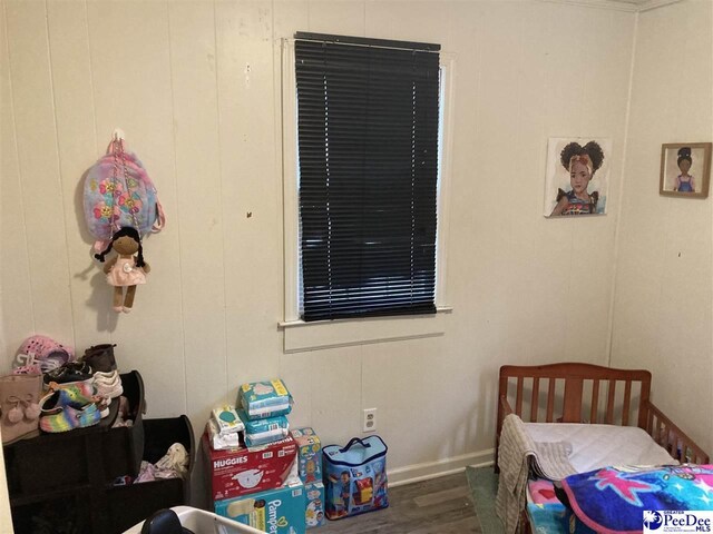 606 Curry St, Dillon, SC 29536 - bedroom with dark wood-type flooring