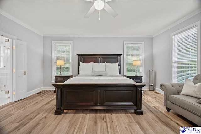 bedroom with crown molding, ceiling fan, and light hardwood / wood-style flooring