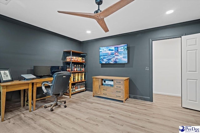 office space with crown molding, light hardwood / wood-style floors, and ceiling fan