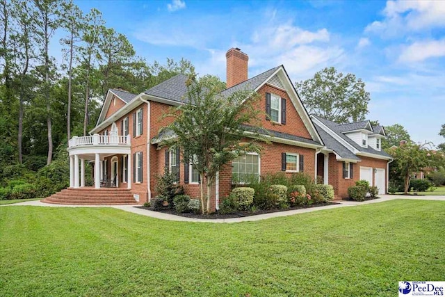 view of property exterior featuring a balcony, a yard, a porch, and a garage