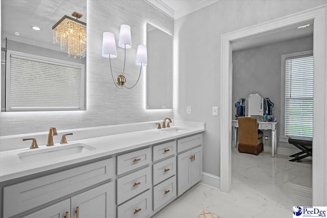 bathroom with crown molding and vanity