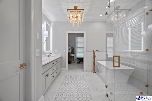 bathroom featuring vanity, a notable chandelier, crown molding, and shower with separate bathtub