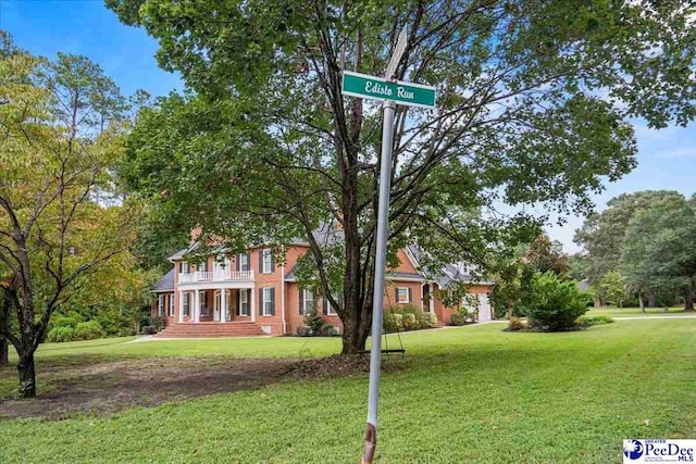 view of front of property with a front yard