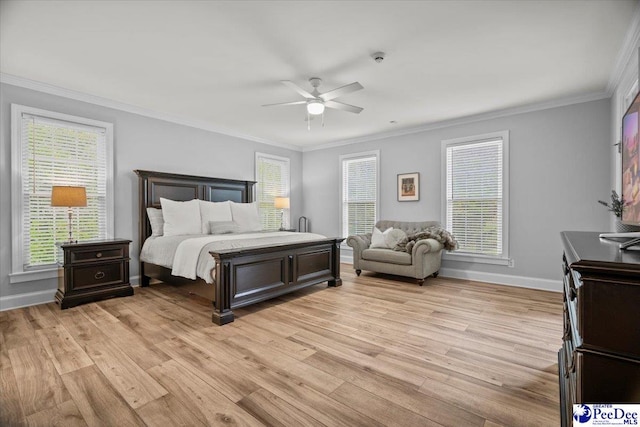 bedroom featuring ceiling fan, ornamental molding, and light hardwood / wood-style flooring