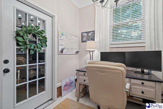 office area with ornamental molding