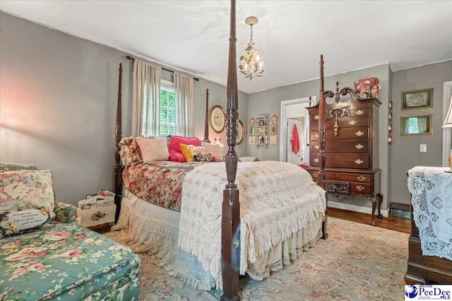 965 Scriven Dr, Flornce, SC 29501 - bedroom featuring wood finished floors and baseboards