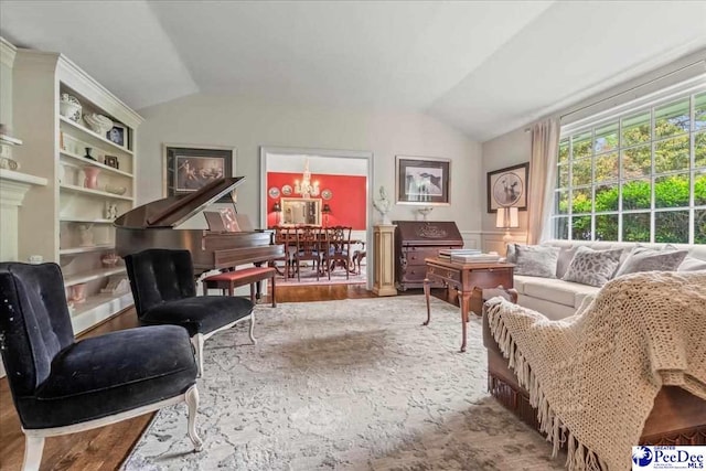 965 Scriven Dr, Flornce, SC 29501 - living area featuring lofted ceiling and wood finished floors