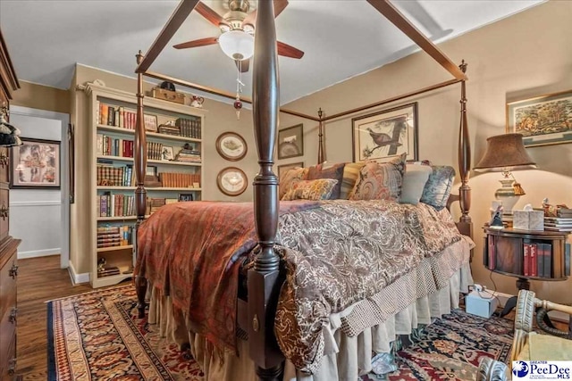 965 Scriven Dr, Flornce, SC 29501 - bedroom featuring wood finished floors, baseboards, and a ceiling fan