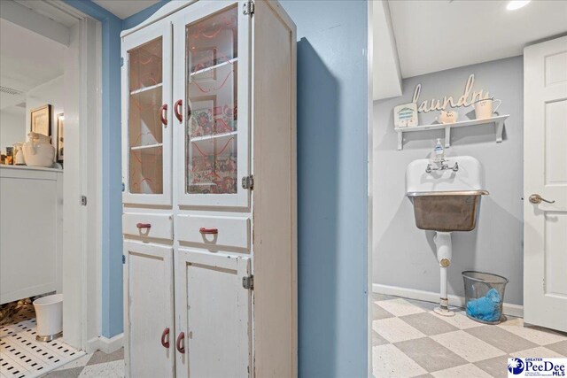 965 Scriven Dr, Flornce, SC 29501 - bathroom featuring tile patterned floors and baseboards